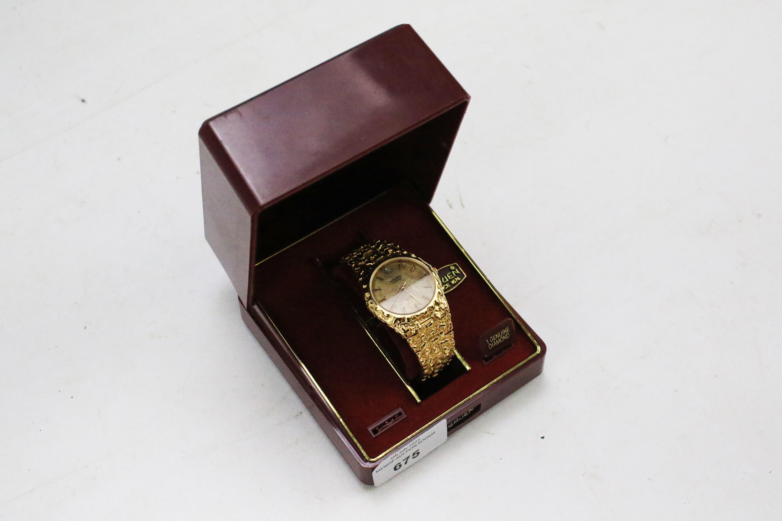 A boxed Gruen diamond quartz gentleman's wristwatch.
