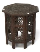 An early 20th century Indian folding table of octagonal form.