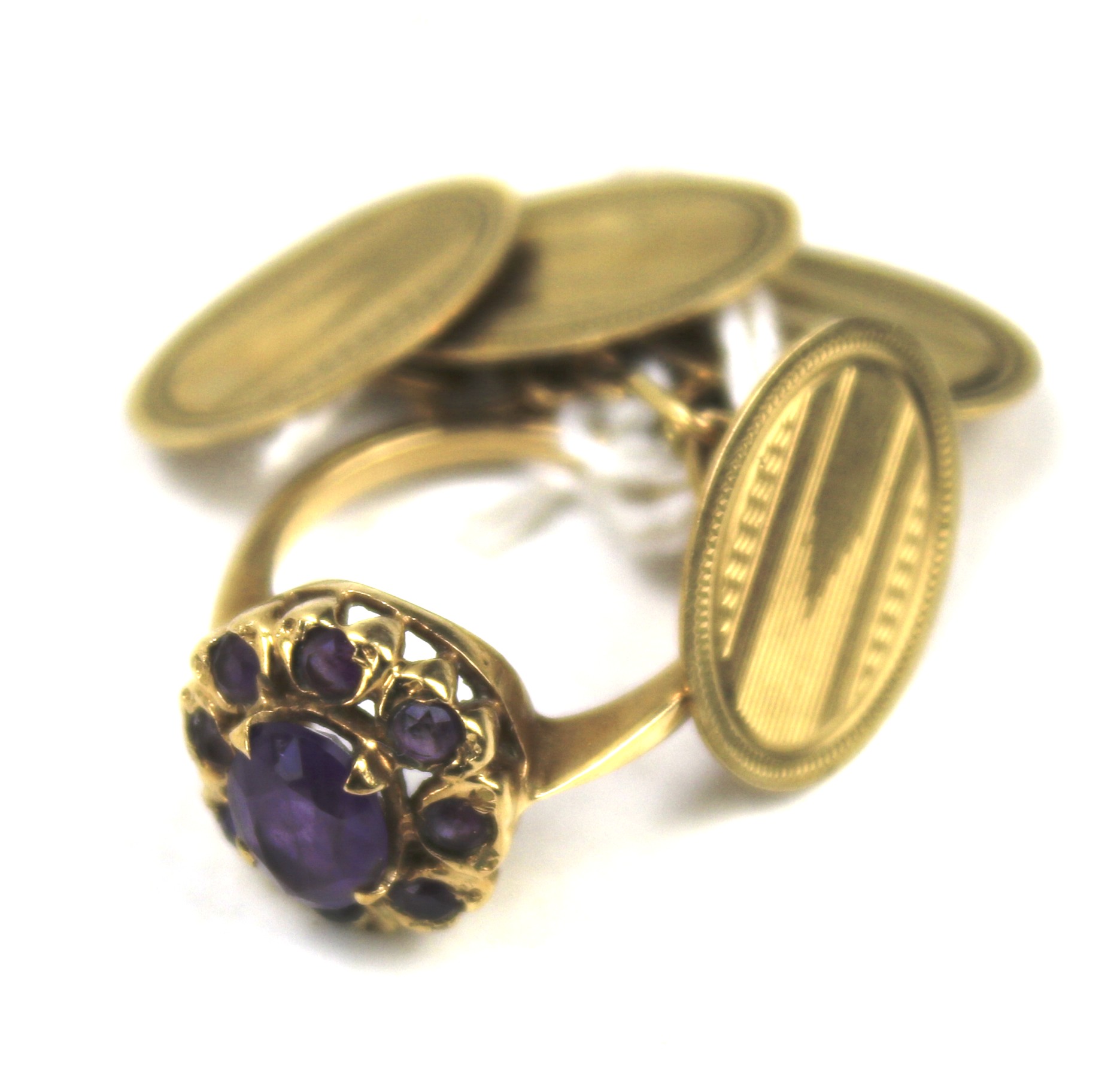 A pair of 9ct gold cufflinks and a yellow metal cluster ring.