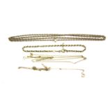 An assortment of 9ct gold and yellow metal jewellery. Including chains and bracelets.