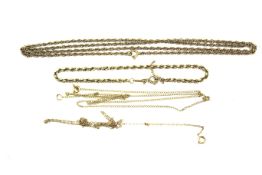 An assortment of 9ct gold and yellow metal jewellery. Including chains and bracelets.