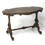 A 19th century veneered occasional table.