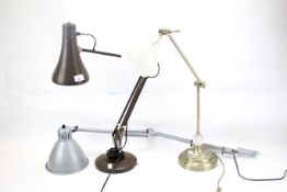 Three adjustable desk lamps.