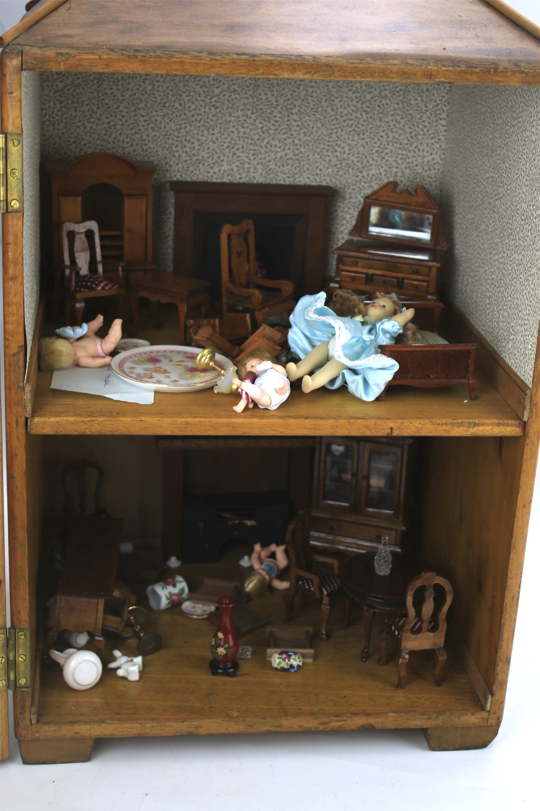 A vintage wooden dolls house with contents. - Image 2 of 2