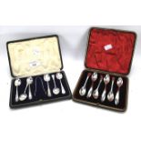 A Victorian silver cased spoon and tongs set and a set of six silver spoons.