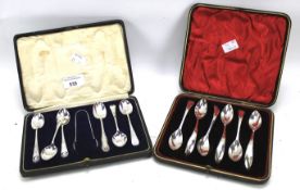 A Victorian silver cased spoon and tongs set and a set of six silver spoons.