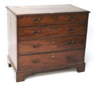 A mahogany chest of drawers.