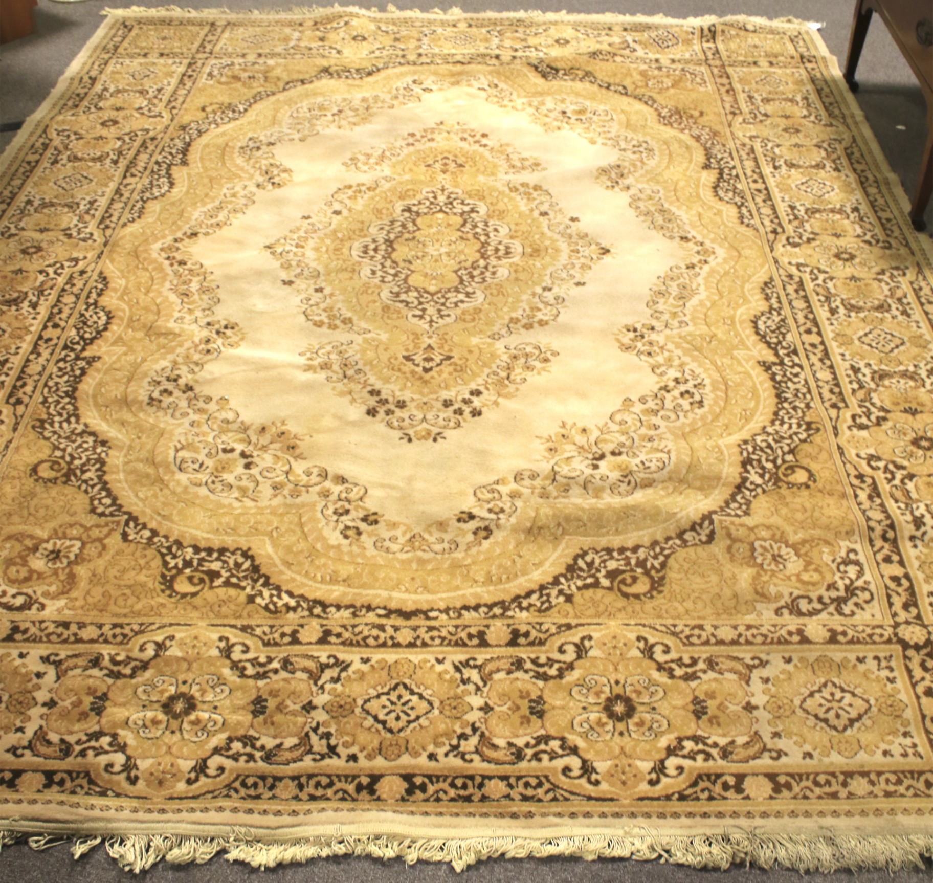 A large woollen blend rug.