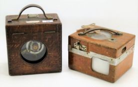 Two early 20th century pigeon racing clocks.