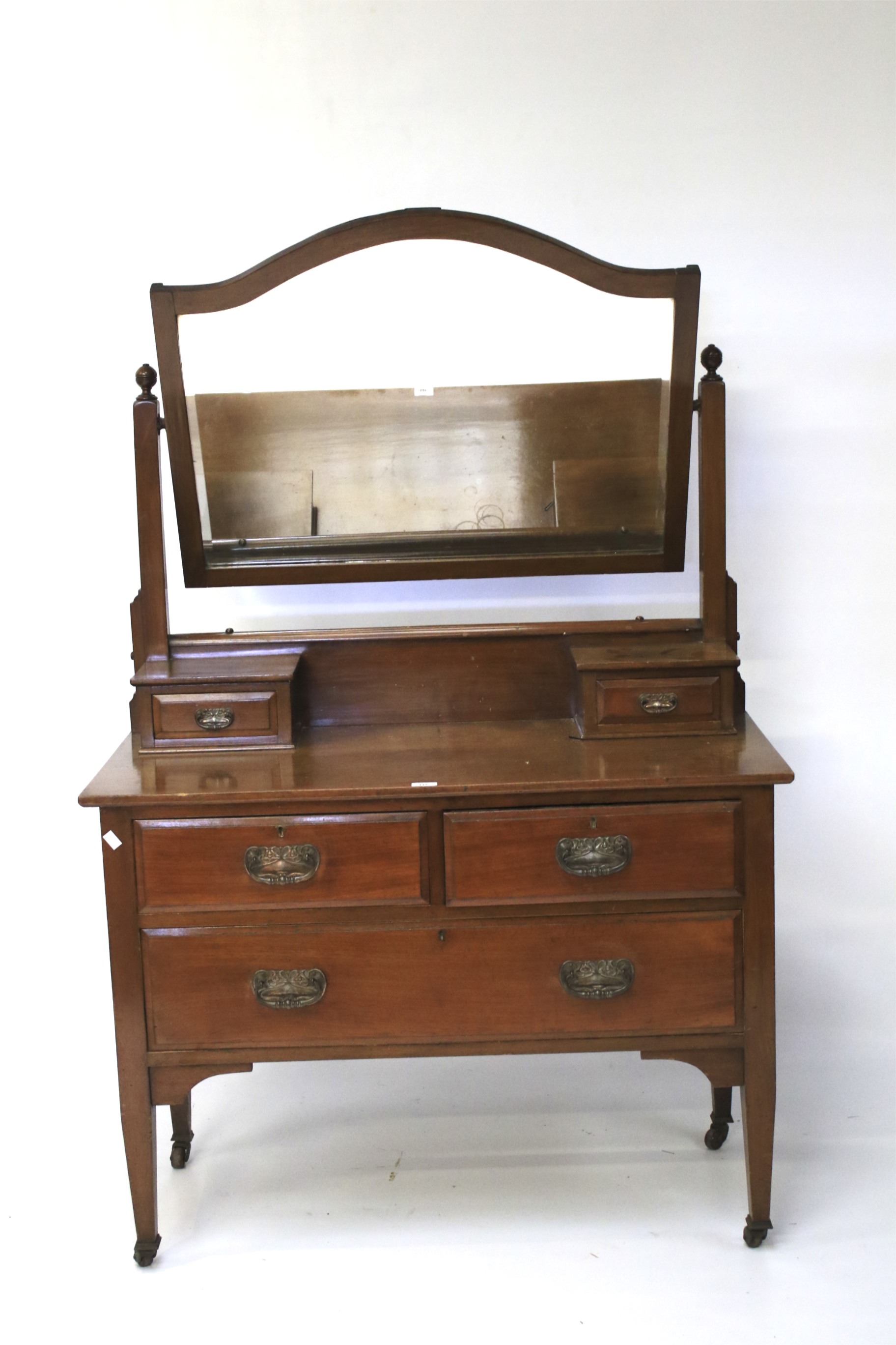 A 20th century mahogany dressing table.