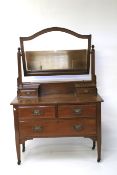 A 20th century mahogany dressing table.