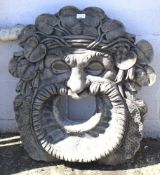 A large composite garden wall mask water feature.