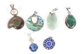 Six silver and semi-precious stone pendants including jade and malachite