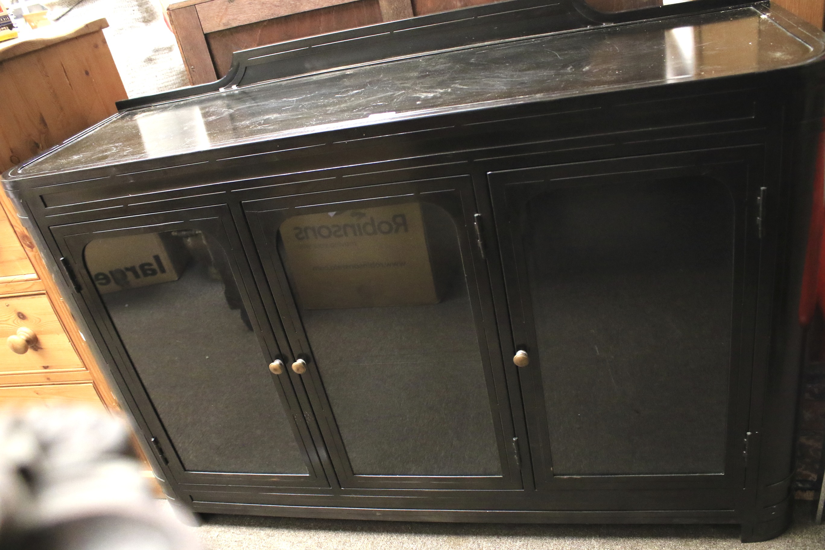 A contemporary cast metal glazed kitchen unit.