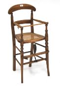 An early 20th century mahogany child's high chair.