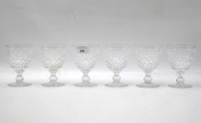 A set of six Edinburgh crystal cut glass wine goblets. H12.