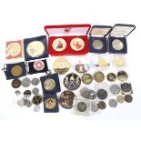 An assortment of mostly commemorative coins.