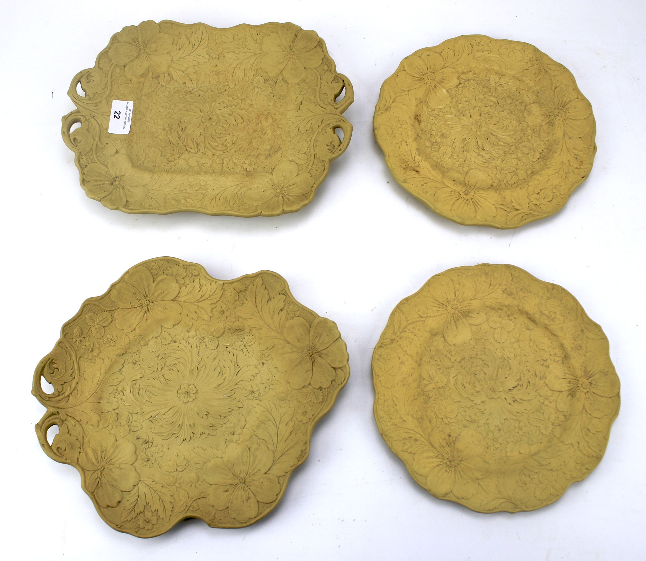 Four mid-19th century threadwork plates.