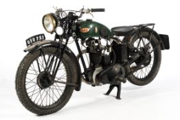 A 1933 BSA 150cc motorbike in black and green.