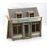 A vintage scratch built dolls house.