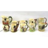 A collection of nine mostly Crown Devon musical tankards.