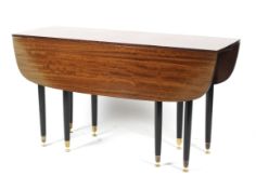 Ernest Gomme for G-Plan Librenza drop-leaf dining table.