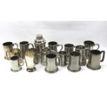 A collection of pewter, chrome and silver plated tankards.