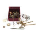 A jewellery box containing vintage jewellery.
