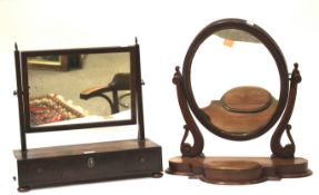 Two dressing table swing mirrors.