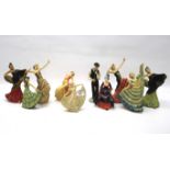 An assortment of Crown Devon ceramic figures of ladies.