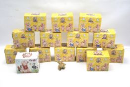 A collection of 14 Piggin & Friends collectable figures.