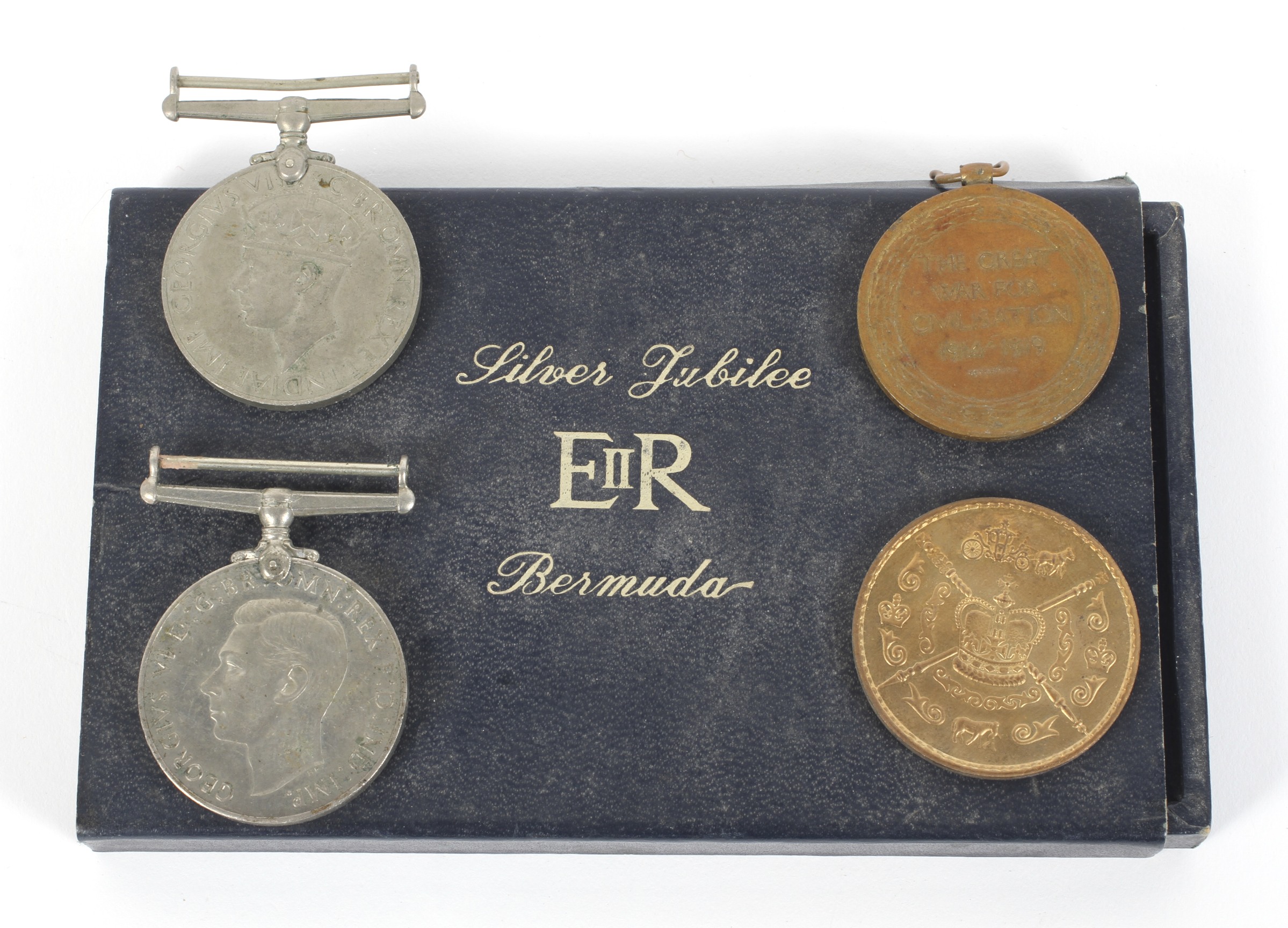 A WWI Victory medal and two WWII medals. - Image 2 of 2