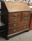 A Victorian oak bureau.