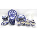 An assortment of Staffordshire blue and white pottery and a Chinese porcelain blue and white ginger
