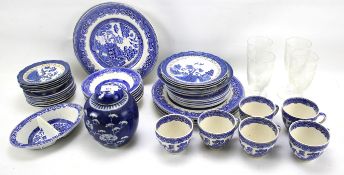 An assortment of Staffordshire blue and white pottery and a Chinese porcelain blue and white ginger