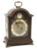 An Elliott mantel clock retailed by G H Pressley & Sons.