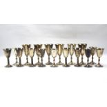 Seventeen silver plated goblets.