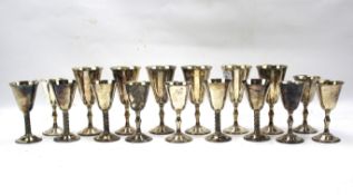 Seventeen silver plated goblets.