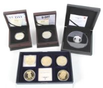 Selection of boxed proof coins.