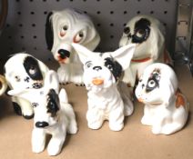 A collection of Crown Devon Bonzo ceramic figures of dogs.