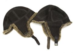 Two 20th century flying caps.