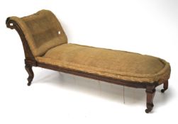 A Victorian chaise longue.