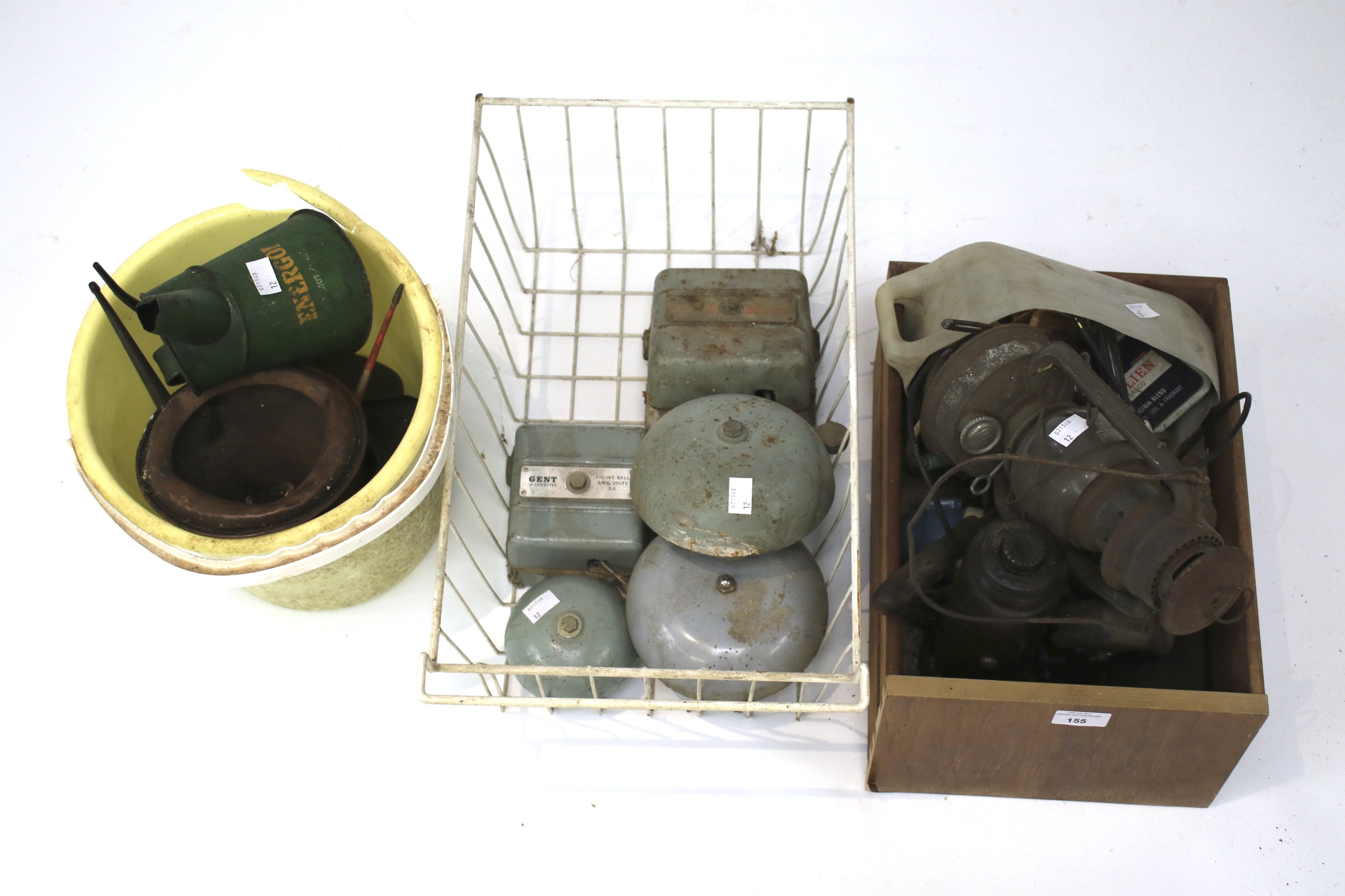 A collection of early 20th century and later oil cans.