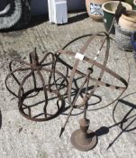 Two decorative metal garden items.