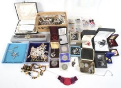 A large collection of assorted silver plate, watches and costume jewellery.