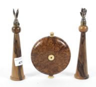 A pair of Jerusalem olive wood and gilt-metal mounted candlesticks and a flask.