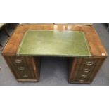 A retro style mahogany kneehole desk.