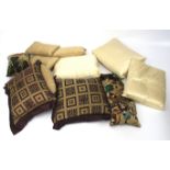 A quantity of assorted cushions, some having oriental decoration.