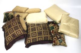 A quantity of assorted cushions, some having oriental decoration.