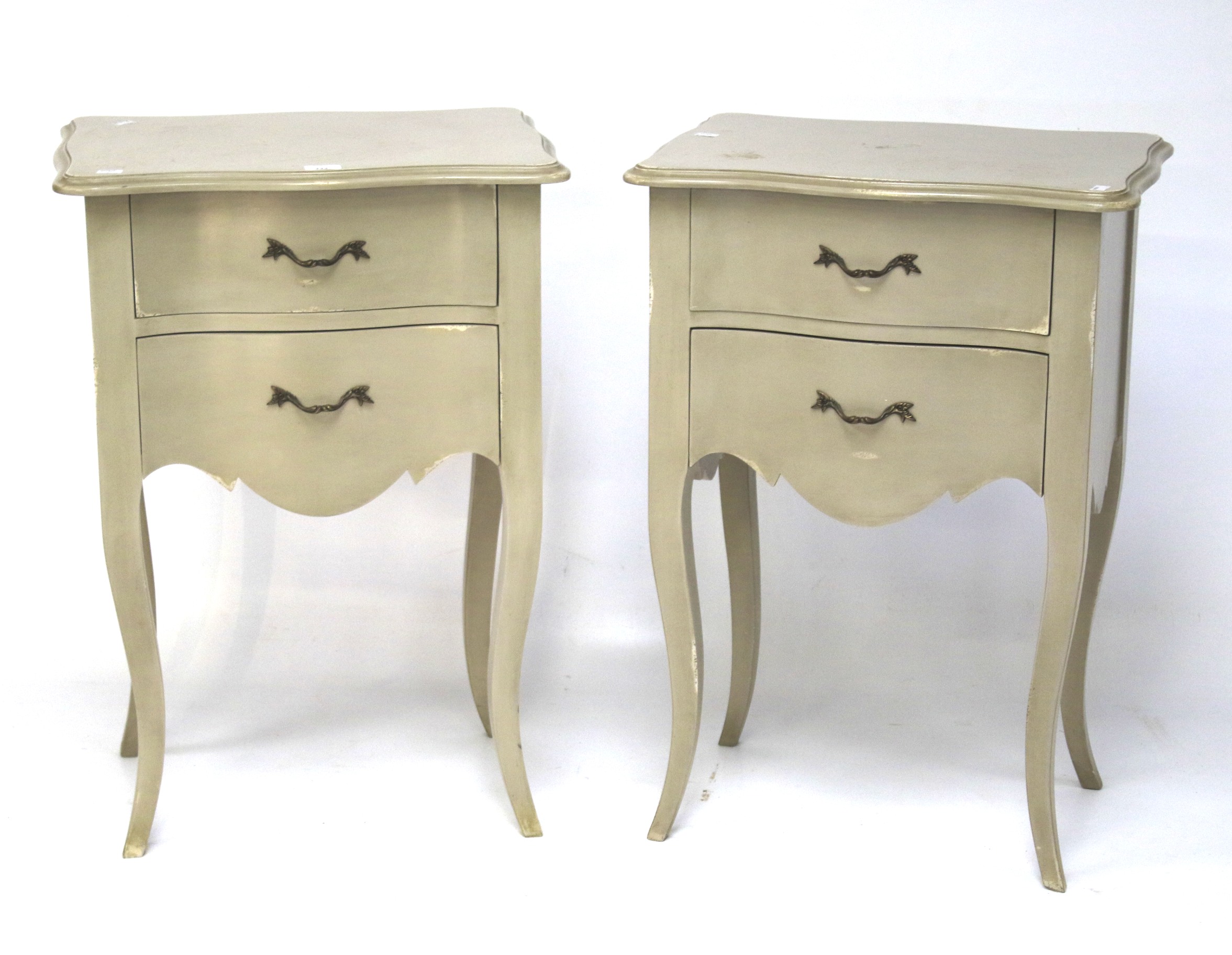 A pair of grey painted bedside cabinets.